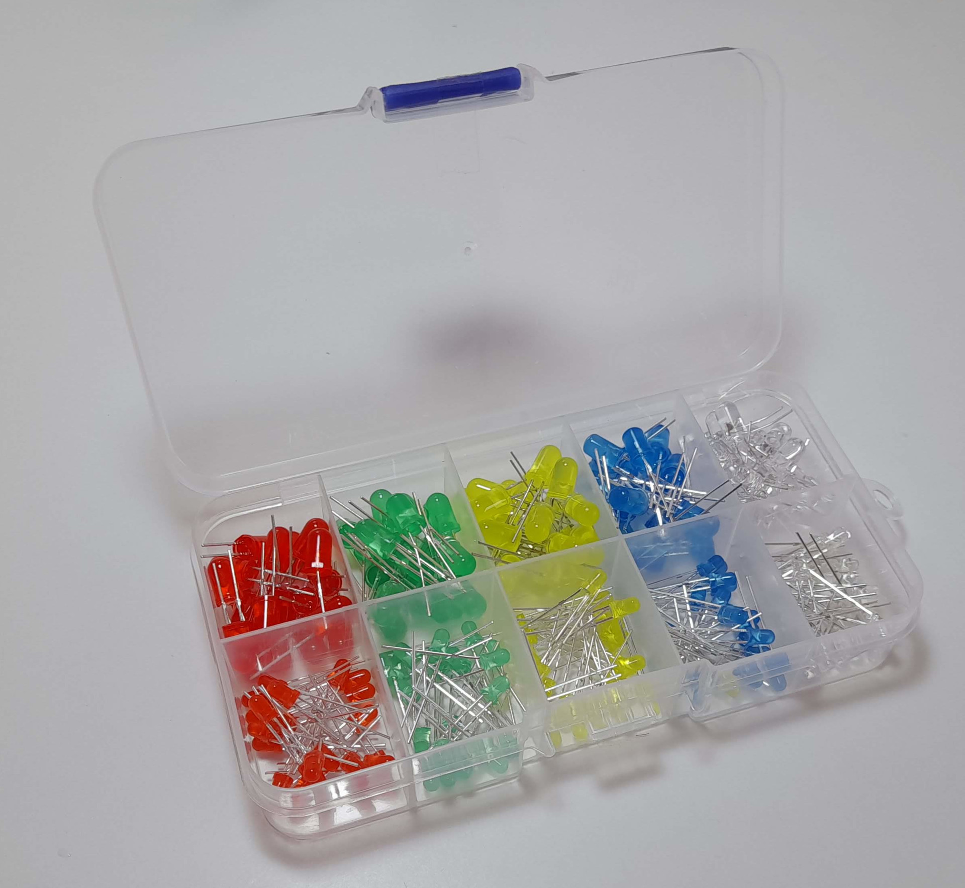 An organized transparent case containing LEDs of various colors
